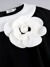 AOMEIDRESS Elegant Black White Colorblock Dress Peplum Floral Detail