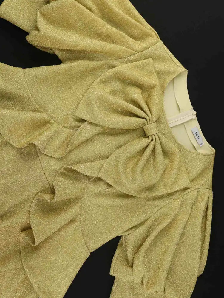 Elegant gold spring dress for wedding featuring ruffles and bow details perfect for trendy plus size dresses for wedding guest and formal events

