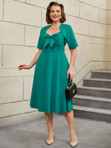 AOMEIDRESS Green Short Sleeve A Line Dress Featuring Statement Bow Front

