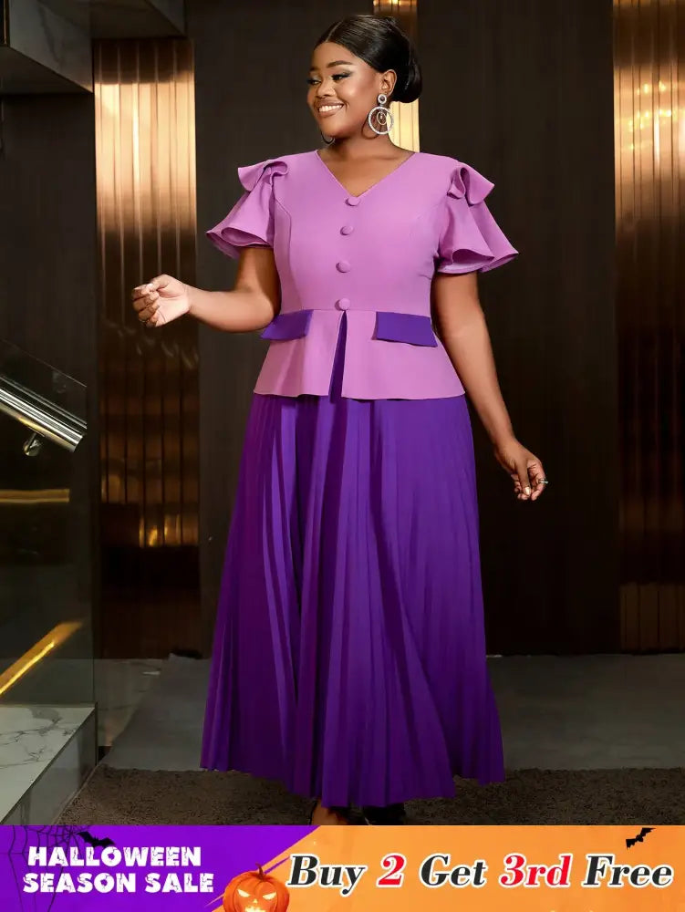 Elegant pleated dress wedding guest style perfect as church clothes for women with ruffle sleeves and colorblock design for a flattering look.








