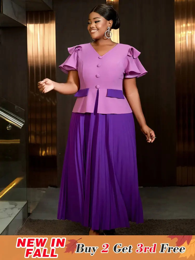 Elegant pleated dress wedding guest style perfect as church clothes for women with ruffle sleeves and colorblock design for a flattering look.








