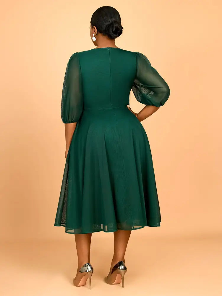 This dress blends comfort and sparkle perfect for plus size wedding guest dresses plus size prom dresses or stylish birthday outfits

