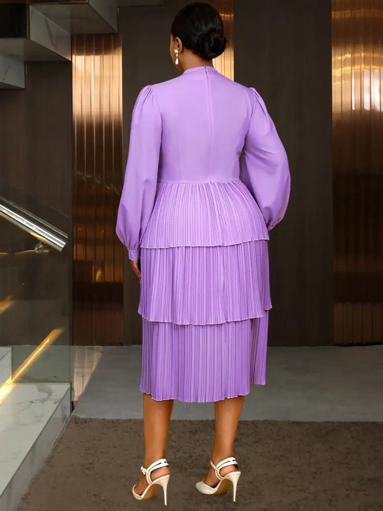 Elegant spring dresses to wear to a wedding perfect as plus size church dresses or stylish going out outfits in soft chiffon with lantern sleeves.

